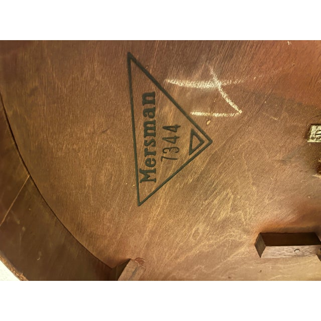 A classic vintage Mersman round pedestal side table, model 734, showcasing timeless American craftsmanship and elegant...