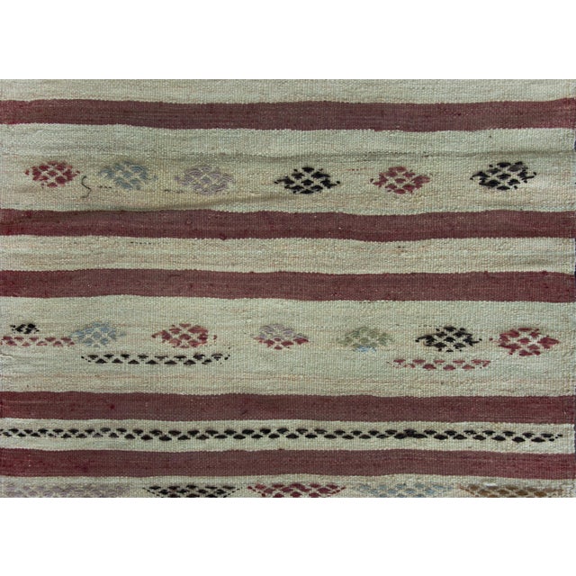 A beautiful mid-20th century Turkish Konya kilim runner with repeated red and white stripes, and with embroidered multi-...