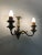 Pair of Empire-style double-light bronze wall sconces. Early 20th century Charming vintage pair of Empire-style wall...