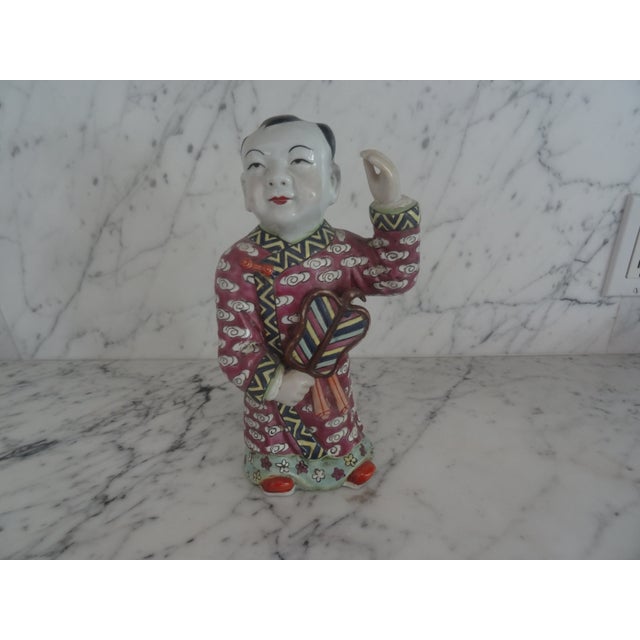 A beautiful Chinese Ho Ho Boy probably 1949-1950. In Chinese culture depictions of healthy boys represent good fortune.