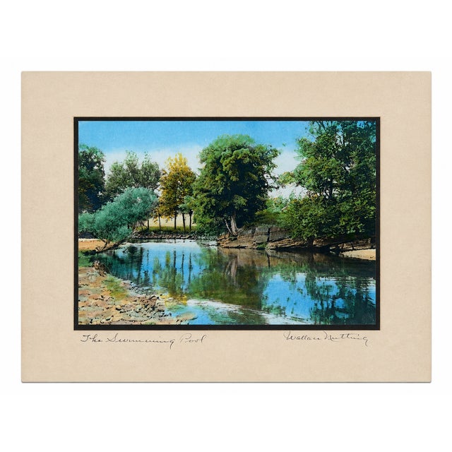 A charming original Wallace Nutting hand-colored photograph titled “The Swimming Pool,” depicting a tranquil tree-lined...