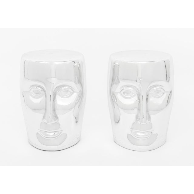 Pair of Philippe Starck for XO "Bonze" Stools, metallic silver-tone glazed ceramic, labels to undersides. 18" H x 14.5" W...