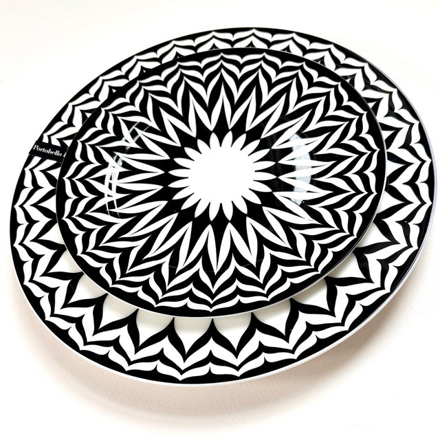 Dramatic black and white bone china serving plates, designed in England by Portobello by Inspire. Discontinued pattern.
