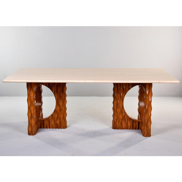 Found and made in Italy, this new, hand-crafted dining table has a brutalist style base and travertine top. Two base units...