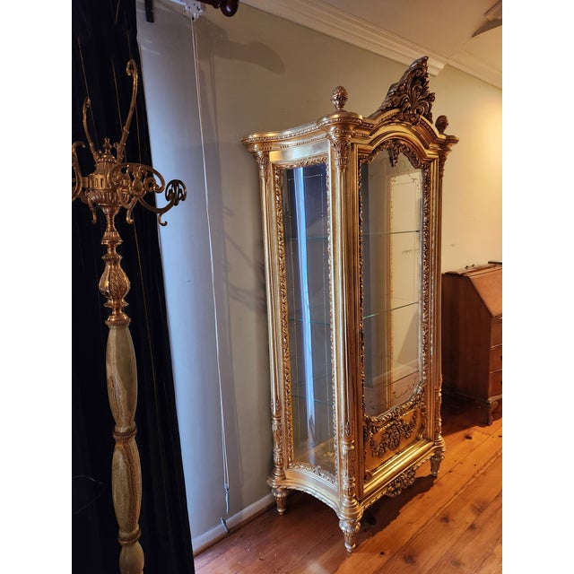 Authentic SILIK luxury display cabinet, handcrafted in Italy and executed in the brand’s signature ornate Baroque/Rococo...