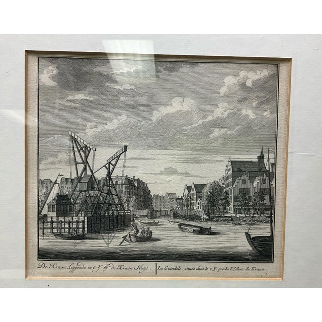 This is a hard to find antique Dutch engraving depicting the 18th-century Waalseiland area in Amsterdam, specifically...