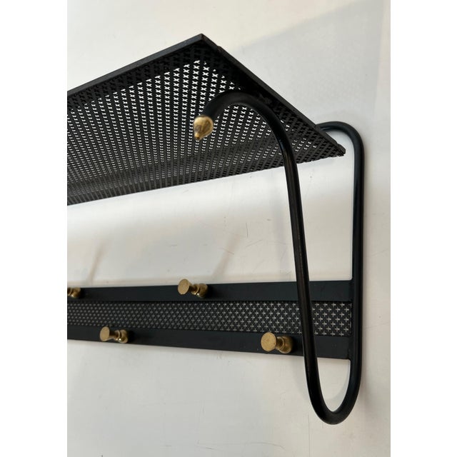 1950s Coat rack in black lacquered metal with perforated sheet metal and brass For Sale - Image 11 of 12