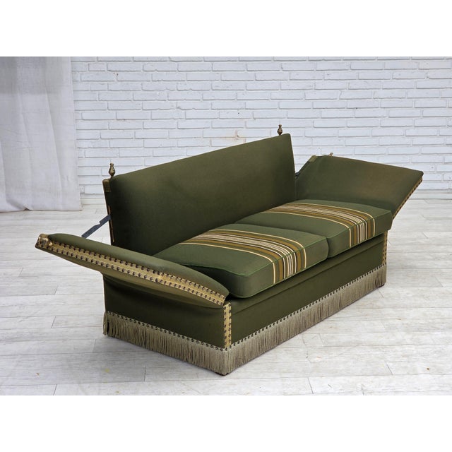 1970s, Danish 2-seater drop arm "Spanish" sofa. Original green furniture wool, ash wood legs, springs in the seat...