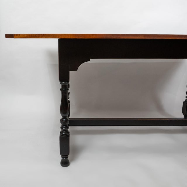 D.R. Dimes Salisbury Tavern Table w/ two extension leaves, Amber and Black Crackle Finish. Dimensions: 72" wide (closed)...
