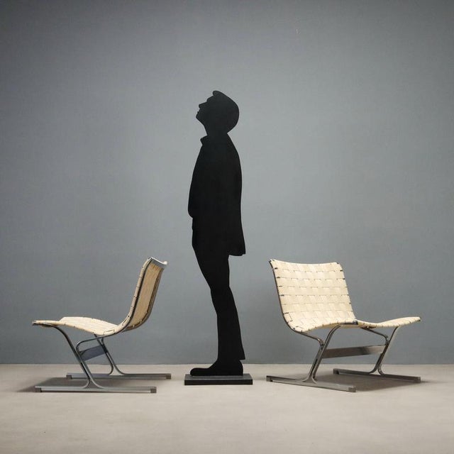 A pair of 'plr 1' armchairs designed by ross littel and produced by icf in the 1970s, featuring a modern and functional...