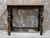 A Superb Oak Hall Table. Made from English Oak, with beautiful hand carving to the top, with a floral design continuing...