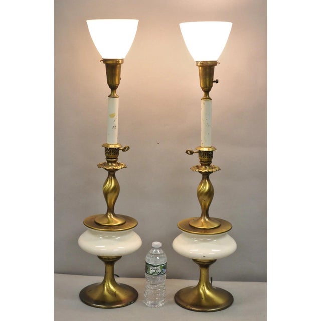 Vintage Rembrandt Hollywood Regency Brass & Porcelain Sculpted Table Lamp Pair. Circa Late 20th Century. Measurements: 34"...