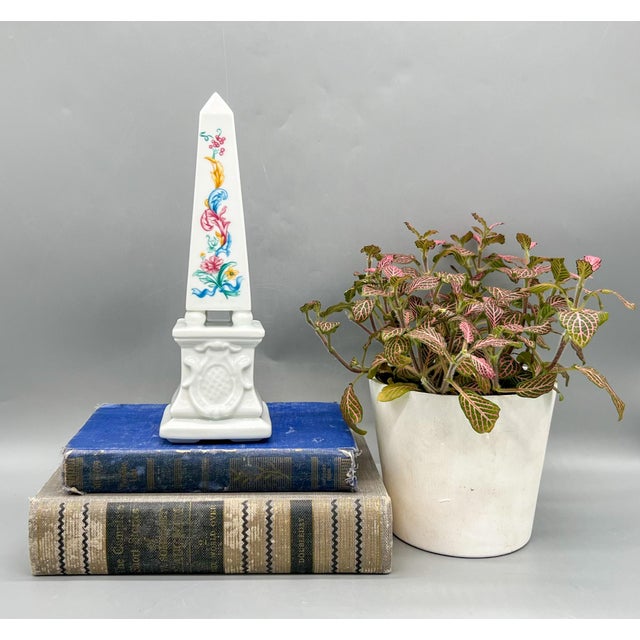 Charming obelisk made in the late 20th century for Elizabeth Arden. Maker's mark is printed on the underside. Gorgeous...