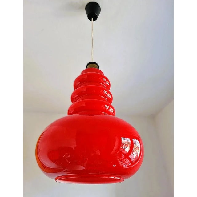 Peill & Putzler, Pendant Lamp Item: Lamp 1 Bulb E27 Age: Approx. 1970s Material: Glass Color: Red Dimensions: Total height...