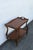 This classic Tea Cart is made of wood, solid wood, exotic wood, and veneer. The Cart has a Traditional style and design,...
