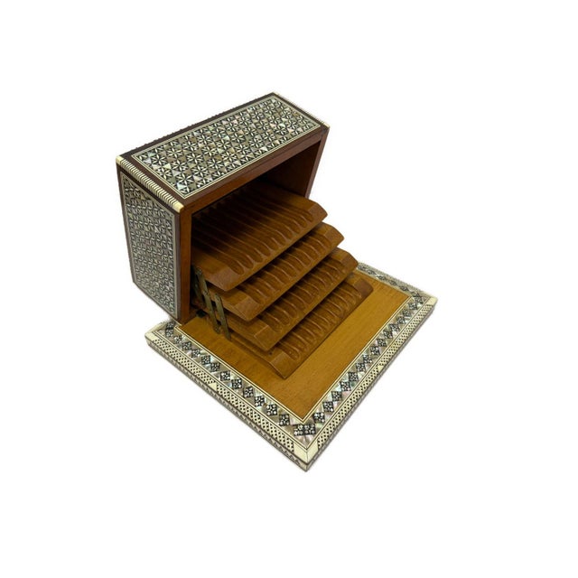 Bring timeless elegance to your smoking accessories collection with this handcrafted wooden cigarette box, beautifully...
