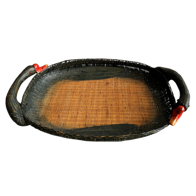 A vintage Shanghai Handicrafts goose basket tray with an elongated woven body and sculptural goose-head handles. Handwoven...