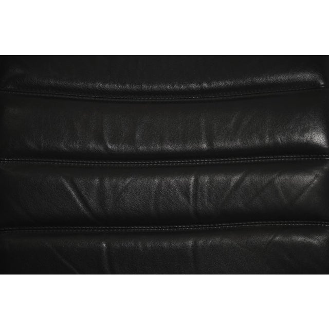 This set of two minimalist chairs was manufactured in germany by pol international during the 1960s. The chairs are...