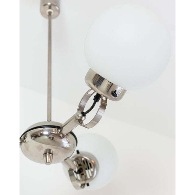 Bauhaus Chrome and Glass Pendant, in Flawless conditions. Designed 1970 to 1979 Up to 250V (Europe/UK Standard).The wiring...