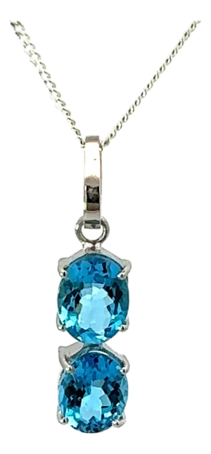 Elegant Blue Topaz 6.48 Carat Oval Cut Two Stone Silver Pendant
