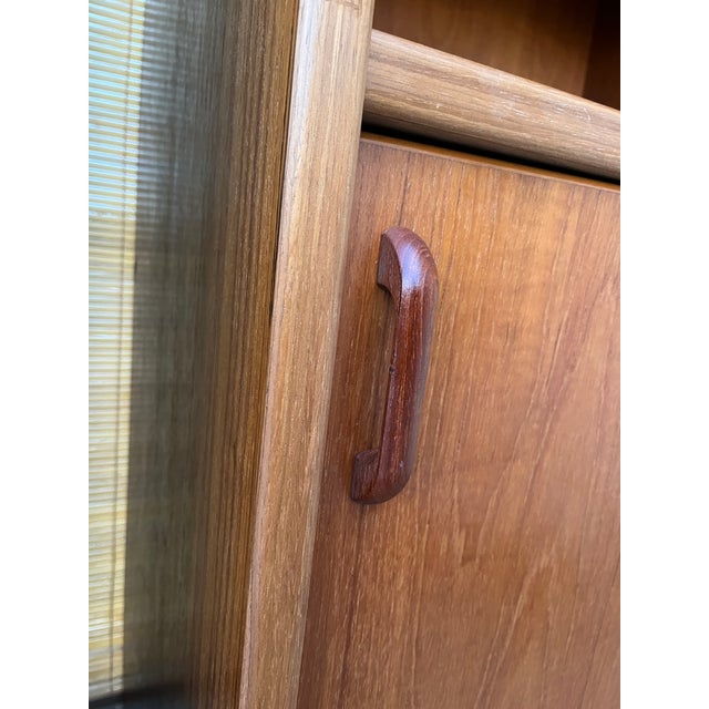 A Pair of Vintage Single-Column Danish Teak Bookcases With Cabinet Storage. Circa 1970s For Sale - Image 11 of 17