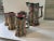 Multi-colored festive faux bois bar set with six handles mugs and a large pitcher. There are no makers marks. Fun summer...