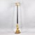 French gilded and patinated bronze floor lamp , with putti at the base and three gilded candlesticks. End of the 19th...