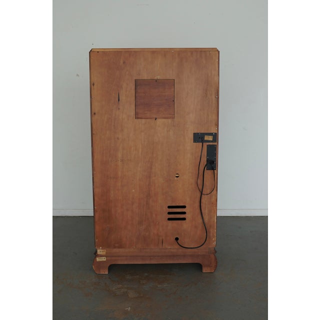 This vintage Henredon Folio 10 Chinoiserie armoire is a true statement piece, featuring a dramatic lacquered finish and...