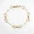Stylish vintage Equestrian themed horse bit bracelet crafted in 14 karat yellow gold (circa 1960s to 1970s). The primary...