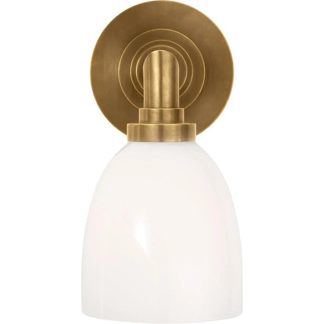 Wilton Single Bath Light in Hand-Rubbed Antique Brass with White Glass Designer: Chapman & Myers Height: 10.25" Extension:...