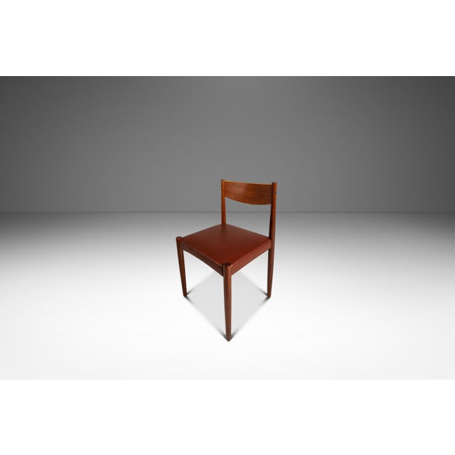This refined Mid-Century Danish Modern side / dining chair by Poul Volther for Frem Røjle exemplifies the clean elegance...
