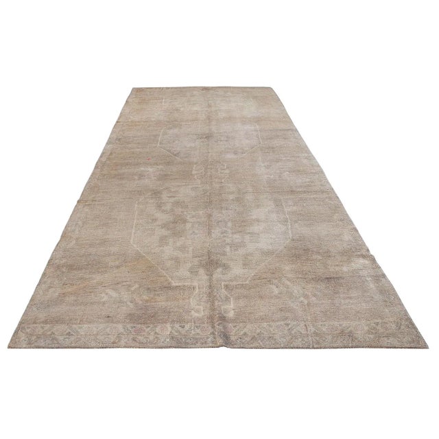 Vintage handknotted decorative wool rug from Kars region of Turkey. Approximately 50-60 years old. In very good condition.