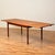Dining table was manufactured in Denmark in the 1950s-60s by Henning Kjærnulf for Vejle furniture factory . It is made of...