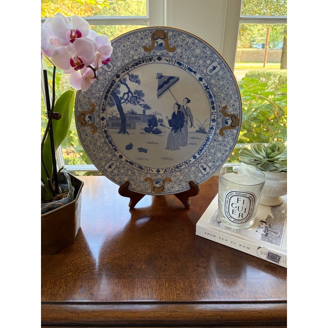 This pretty, hand-painted piece is the perfect size to anchor a collection of wall plates or add a bit of polish and color...
