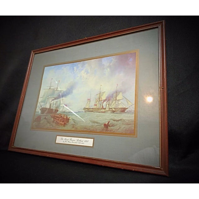 Enhance your space with this beautifully framed reproduction print titled "The Naval Review Spithead" by John Wilson....