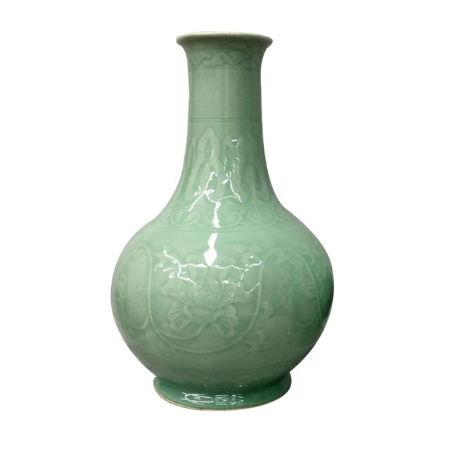You're going to want to clear off a space for the Long neck celedon Vases. Featuring a bulbous base with a slim neck, with...