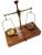 A 19th century brass hanging scale on a wooden base with one drawer and with weights from France.