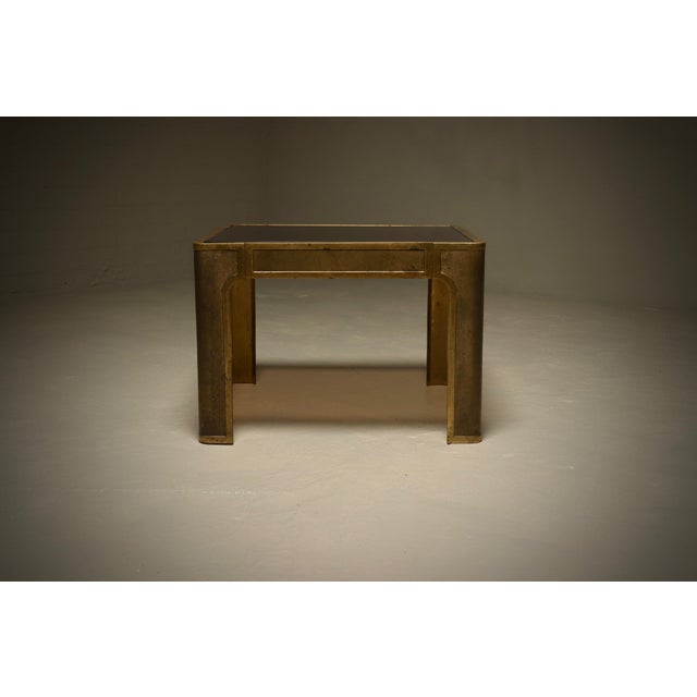 Rare brutalist side table designed by Peter van Heeck in the 1970s. The table makes a bold statement and is cast in solid...