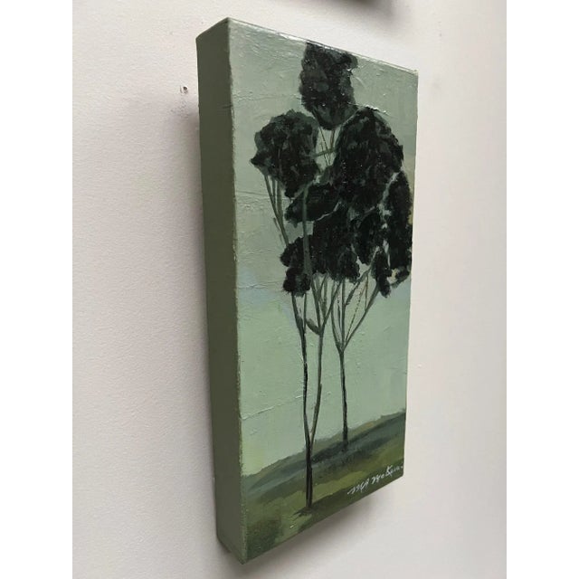 A monochromatic rendering of trees in various shades of green.