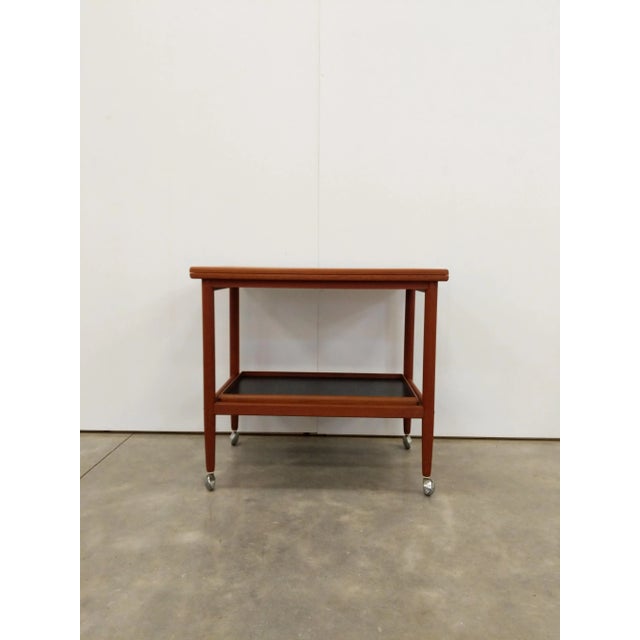 Authentic vintage Danish / Scandinavian Modern teak trolley table / cart / side table on wheels. Expanding mechanism and...