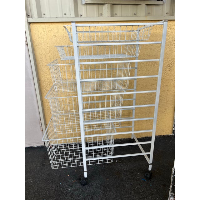 Mid Century Trolly Cart. 5 Metal Grid Drawers that slide out. Easily moves around on plastic wheels. Measures about 17.75”...
