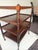Mahogany Tier Table with nice tight turnings on tiny brass castors. English Regency Style, this one is American made in...