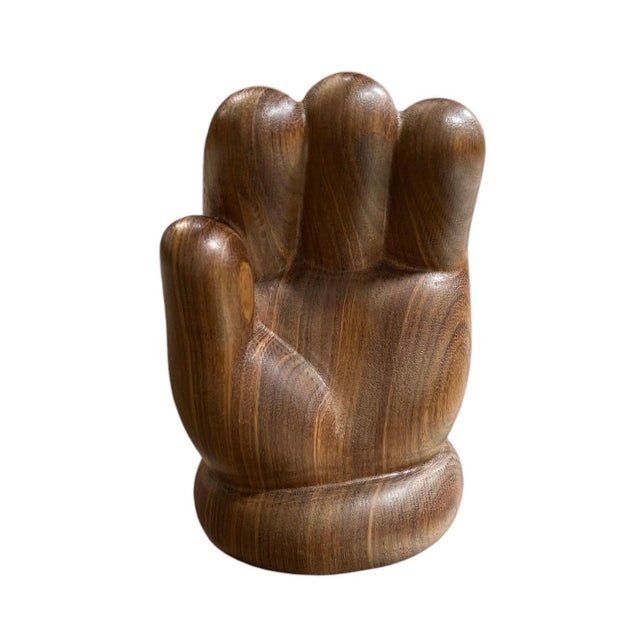 Wood hand 2016 walnut 7 h × 4¼ w × 4 d in (18 × 11 × 10 cm) Engraved signature and inscription to underside Kaws: Giswil...