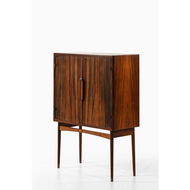 Bar cabinet in dark rosewood, glass and steel by torbjørn afdal, 1960's additional information: material: rosewood, glass...