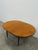 Authentic vintage mid century modern teak extendable dining table with built-in leaf. By G Plan. Maker's label on bottom...