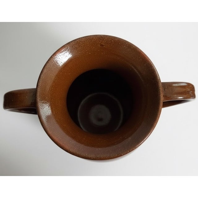 A substantial handmade pottery vase by Kenneth George of Cole’s Pottery in Sanford, North Carolina, part of the celebrated...