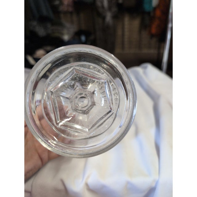 Elegant vintage crystal candy dish with a pedestal base and intricate design. • Beautifully detailed cut glass pattern •...
