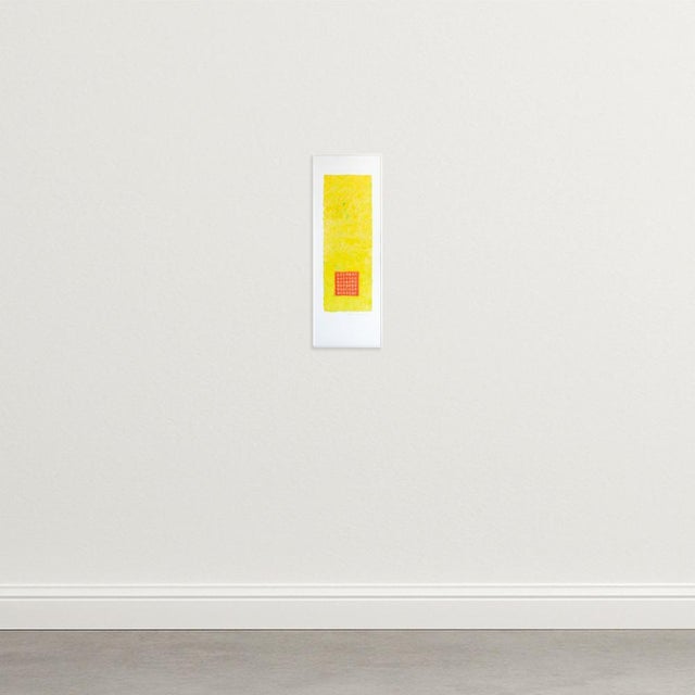 This mixed media work on handmade paper by Montse Vives Roig features a vertical composition dominated by a yellow...