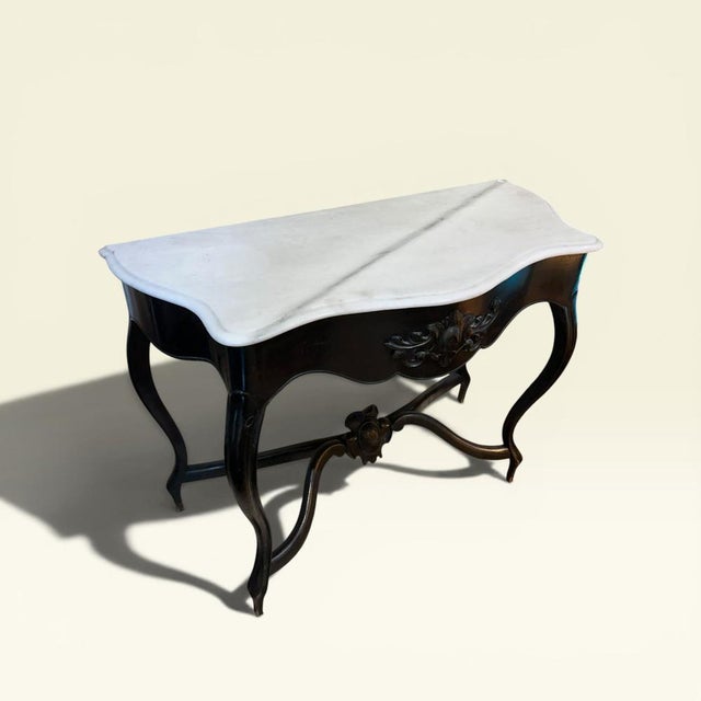 Classic Italian console table with a Carrara marble top in perfect condition. Sleek in design, with a medium-gloss...