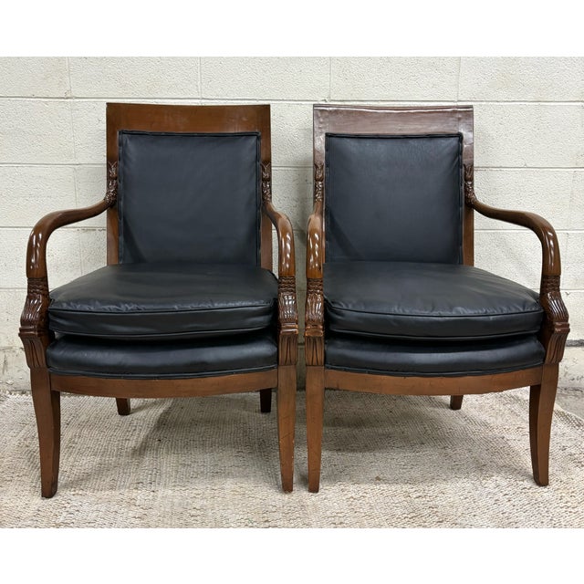This is a stunning pair of vintage French Empire Charles X style Consulate Master armchairs with elements of Regency...